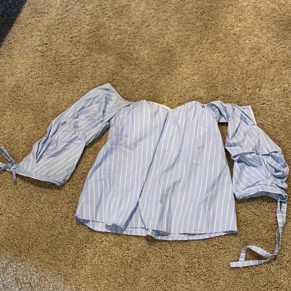 Off the shoulder light blue and white striped blouse with tie and puff sleeves